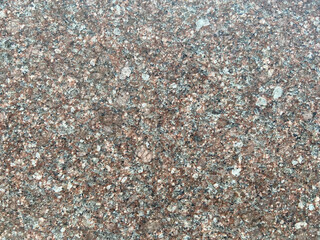 Granite surface showcasing unique speckles and organic textures.