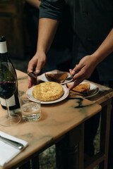 Traditional Argentinian catholic food. Closeup view of puff pastry tuna fish pie slice