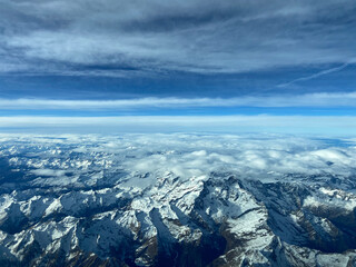 Fototapeta premium Aerial view of snowcapped mountains.
