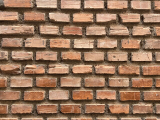 Old brick wall with natural imperfections.