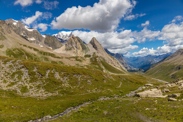 Val Veny mountain landscape in Courmayeur, italian Alps on Tour du Mont Blanc hiking route TMB. Trekking and hiking in the Alps among beautiful landscape and stunning scenery of the Alps green valleys