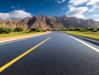 Naklejka premium Asphalt road curves gently toward majestic mountains bathed in bright sunlight. AI Generated