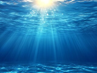 Obraz premium Stunning Underwater Photo: Sunbeams Gently Pierce Deep Ocean Blue. AI Generated