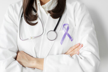 Female doctor with purple ribbon for World Cancer Day, lupus, Pancreatic, Esophageal, Testicular cancer, world Alzheimer, epilepsy, Sarcoidosis, Fibromyalgia and domestic violence Awareness month