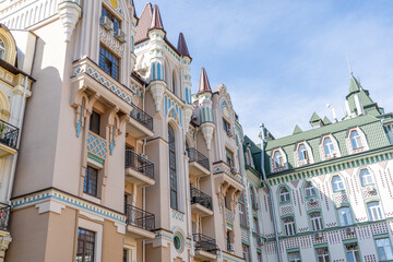 Obraz premium Multicolor modern exterior of houses buildings. Windows balcony facade. Bright architecture street