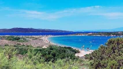 Obraz premium Mouth of the Liscia River along the Sardinian beach or Porto Puddu at sunset. Isuledda Isthmus (Isola dei Gabbiani), Palau, Sassari, Sardinia Island, Italy.
