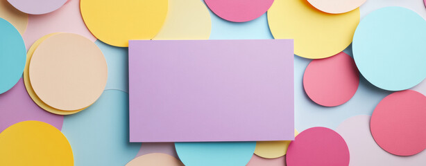 Colorful pastel circles with blank purple card