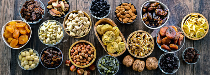 Composition with a variety of dried fruits and assorted nuts.