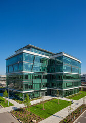 Fototapeta premium Modern Glass Office Building Corporate Campus Green Landscaping