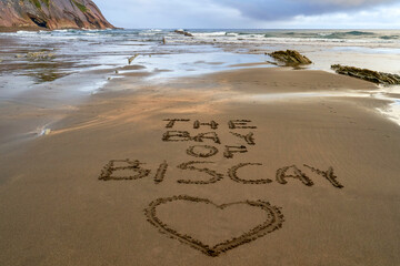 The beach of the Bay of Biscay with the heart on the sand  