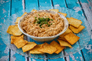 spicy crab dip in al light blue bowl served with pita toast points © James
