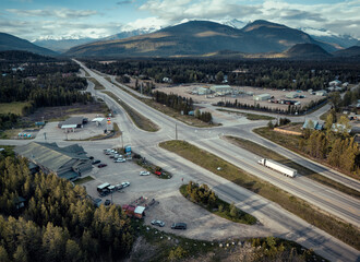 Aerial view of traffic junction in Blue River town, on a Canadian highway stretching through...