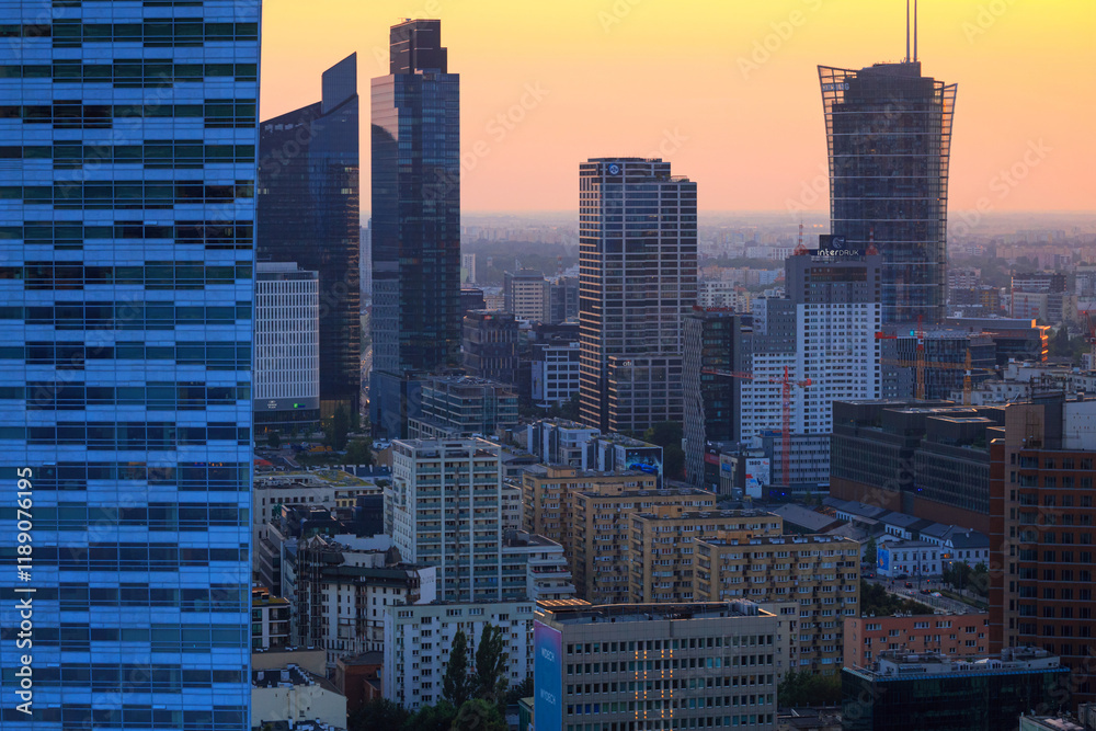 Wall mural Cityscape at sunset - top view of the Downtown district of Warsaw with high-rise buildings, located within the Wola district in western Warsaw, Poland