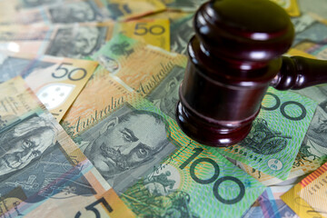 justice gavel with australian aud money. Juridical concept