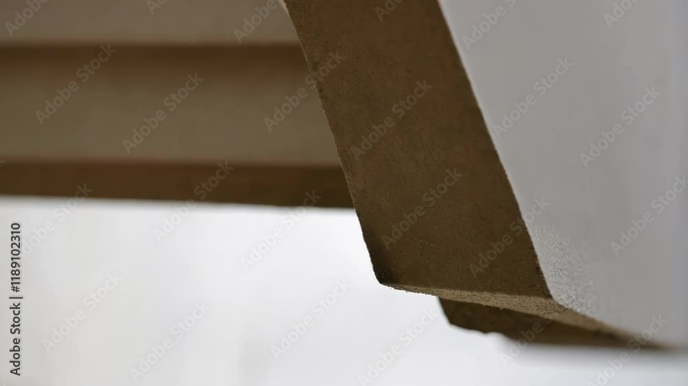 Aufkleber Architectural detail showcasing a precisely aligned gutter joint connection. Emphasizing the seamless overlap and integration of two segments. Highlighting precision in modern construction techniques