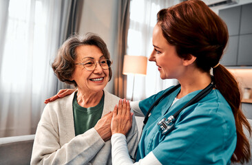  Medical caregiver hug and portrait of nurse with patient for medical help, healthcare or physiotherapy.Volunteer caregiver, charity at nursing home for disability rehabilitation.Senior care.