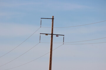 Power electric pole with sky background