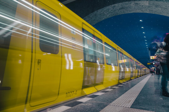 Modern Subway Station with Yellow Train in Motion, BvG, Underground, Berlin/Germany