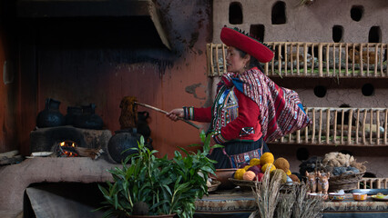 Peruvian artisan dyeing wool with natural pigments in traditional workshop