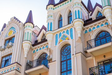 Obraz premium Facade of Colorful Houses. Residential buildings. Bright windows. Balconymodern architecture. Exterior