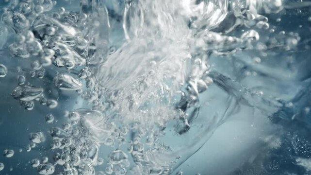 Super Slow Motion Shot of Ice and Air Bubbles in Crystal Clear Water at 1000fps.
