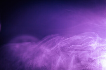 Abstract red and black smoky texture resembling fire or fog, with dramatic swirling patterns creating a sense of heat, mystery, and intensity.