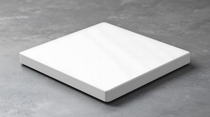 Fototapeta premium White Square Box On Grey Surface Background