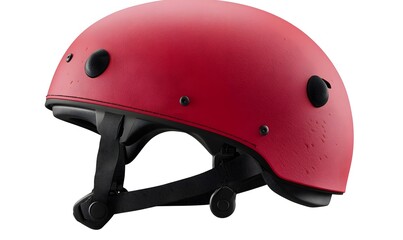Fototapeta premium Red safety helmet, side view, isolated.