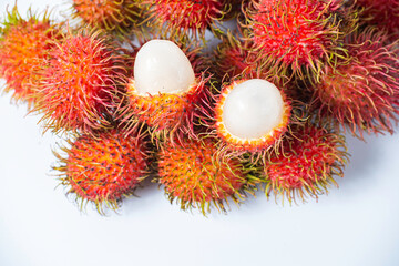 fresh ripe red rambutans (Nephelium lappaceum) on White Background 2