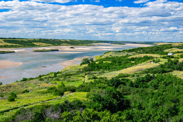 A beautiful landscape with a river and a forest
