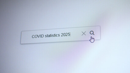 A search bar with the entering query COVID statistics 2025