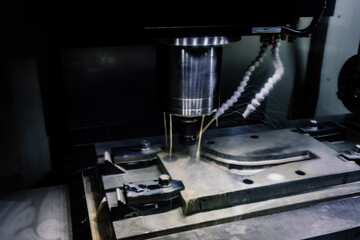 Milling machine with liquid coolant, close up