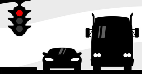 Car and truck on the road and red traffic light