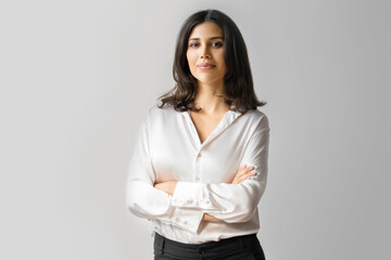Portrait of middle eastern Israel businesswoman, business lady standing with crossed arms isolated...