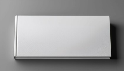 Fototapeta premium horizontal landscape hardcover book mockup on soft gray background n blank cover design for brochure or catalog presentation