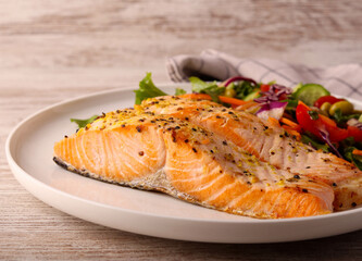 salmon fillet with salad