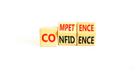 Competence and confidence symbol. Concept word Competence Confidence on wooden cubes. Beautiful...