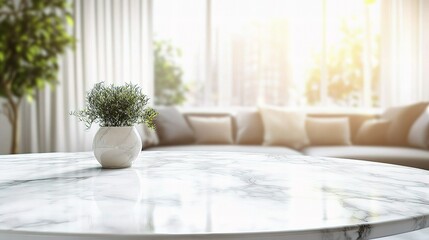 Sunlit Living Room: A small plant in a white vase sits on a round marble table in a bright, airy living room, with a blurred sofa and large window in the background.