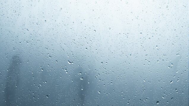 Transparent glass with captivating condensation streaks water droplets cascading down in a refreshing display