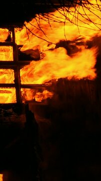 A forest fire destroys a house. The tragedy resulted from a fire in an apartment building.