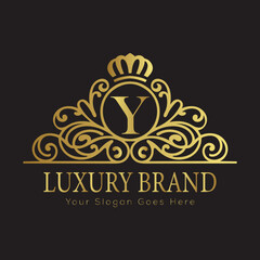 Letter Luxury brand logo design with a royal gold crown emblem and elegant typography
