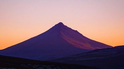 Fototapeta premium Majestic Mountain Silhouette at Sunset, Purple Hues