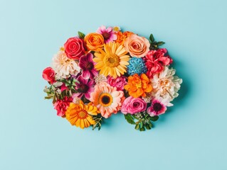 色とりどりの花が集まったアレンジメントが青い背景に映える