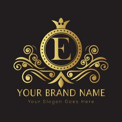 Letter Luxury brand logo design with a royal gold crown emblem and elegant typography
