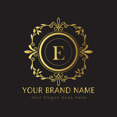 Letter Luxury brand logo design with a royal gold crown emblem and elegant typography
