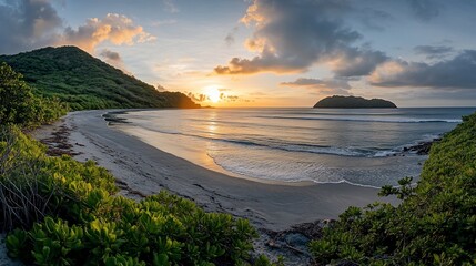 Serene sunset over secluded tropical beach.