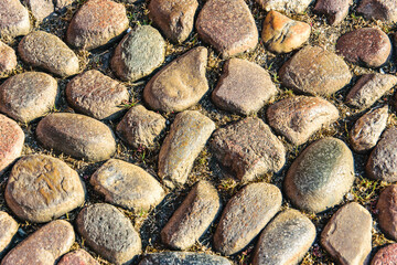 Fragment of an old cobblestone road
