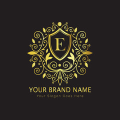 Letter Luxury brand logo design with a royal gold crown emblem and elegant typography

