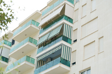 Modern minimalist apartment building in Mediterranean style with air conditioning in Albania on the sea coast. Concept of selling a house abroad, renting apartments