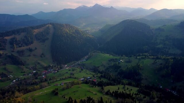 aerial view of green mountain landscape in spring